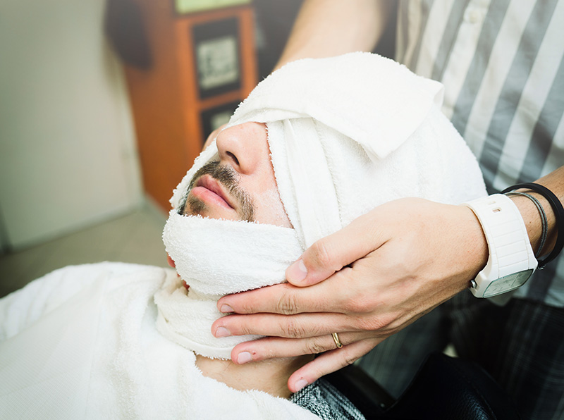 An injured patient in a hospital being examined by a doctor